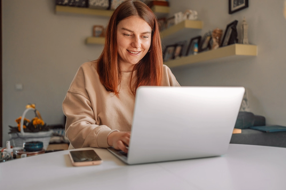 Ecommerce business owner using software tools to run operations